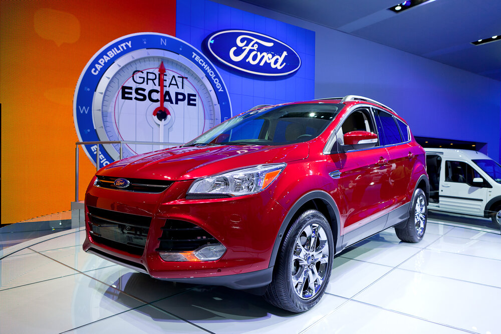 The 2013 Ford Escape Hybrid on display at the 2012 North American International Auto Show Industry Preview on January 11, 2012 in Detroit, Michigan._shutterstock 92705866