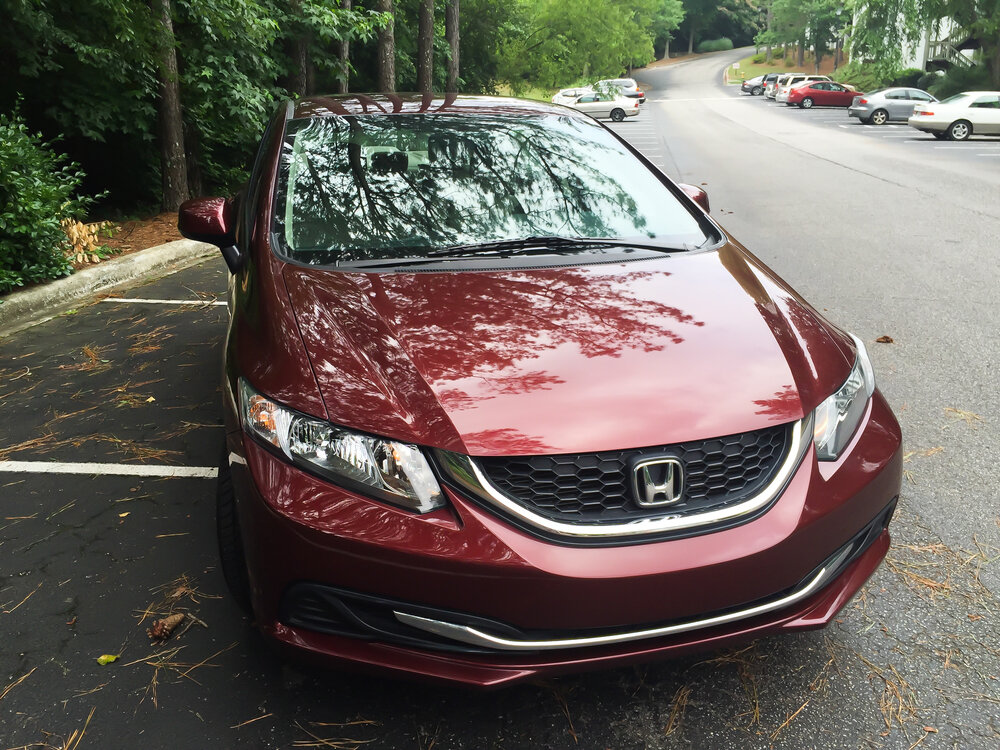 Birmingham, AL, USA, November 11, 2017, Exterior of a maroon colored 2013 Honda Civic Sedan_shutterstock 1794168844