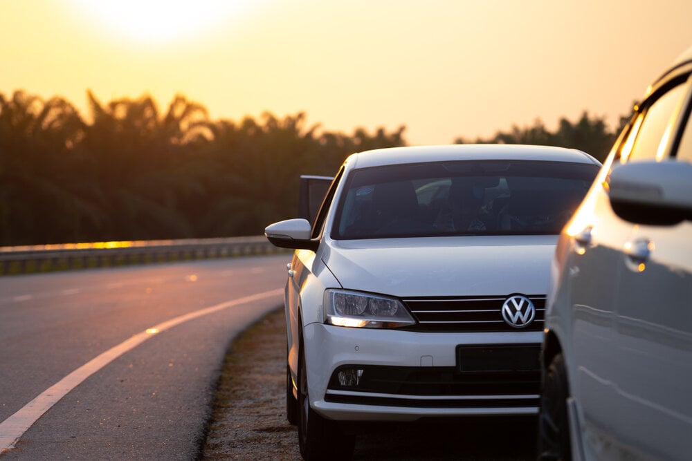 Volkswagen Jetta parked on side road.