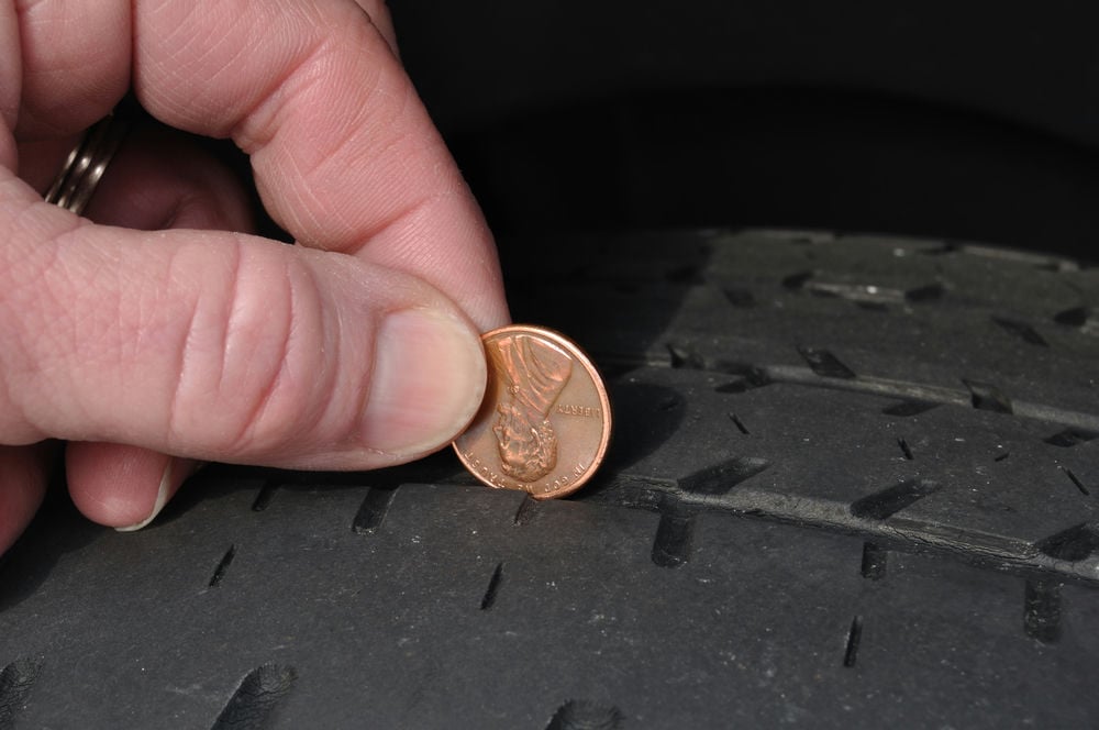 A worn factory tire.