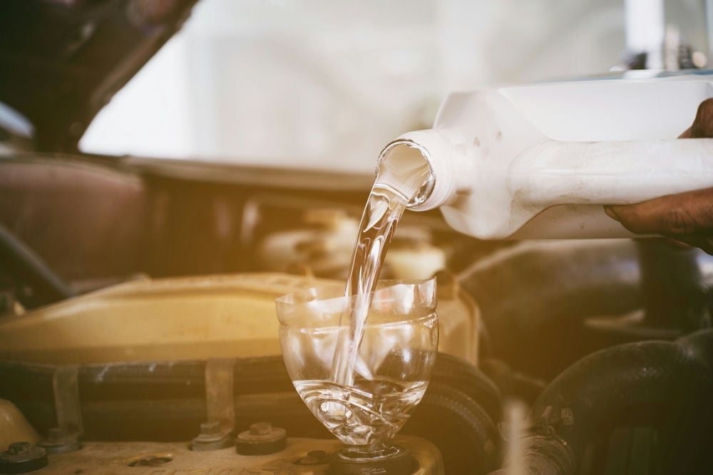 adding_engine_flush_to_an_engine_shutterstock_2112796682
