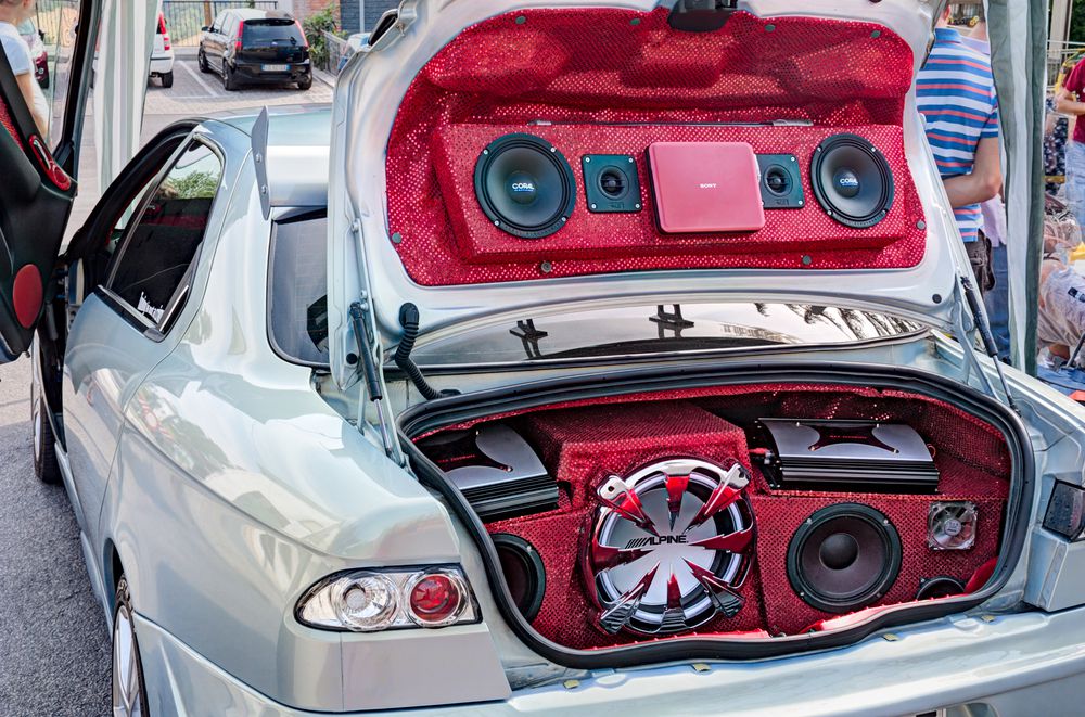 Aftermarket car stereo in parked car with the engine off.