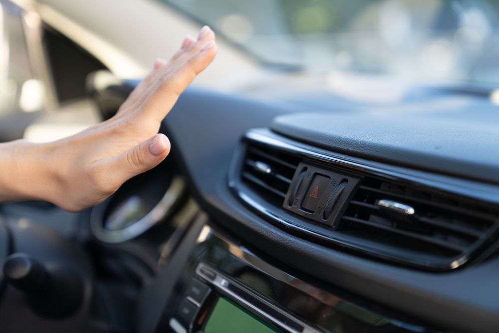 air_conditioner_blowing_warm_air_shutterstock_2065185152