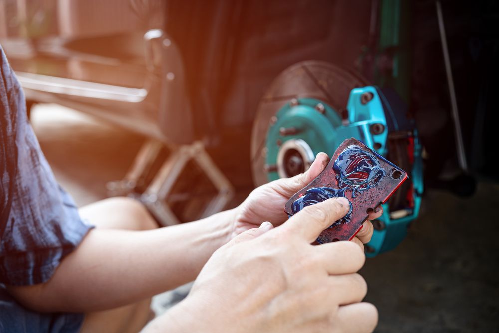 Applying anti-sieze grease to a brake caliper will reduce vibrations and sticky components that can make a grinding noise.