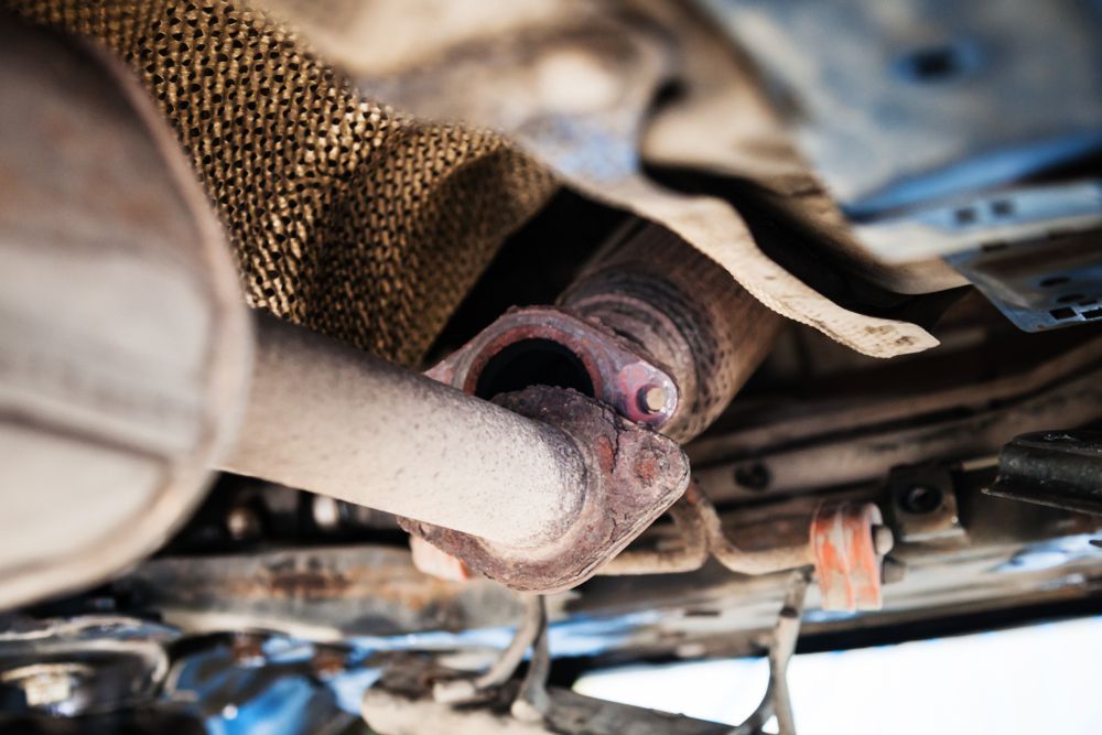 A broken exhaust bracket leading to an exhaust leak.