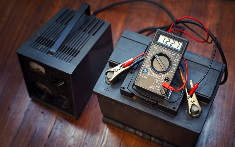 Charging a battery with a trickle charger.