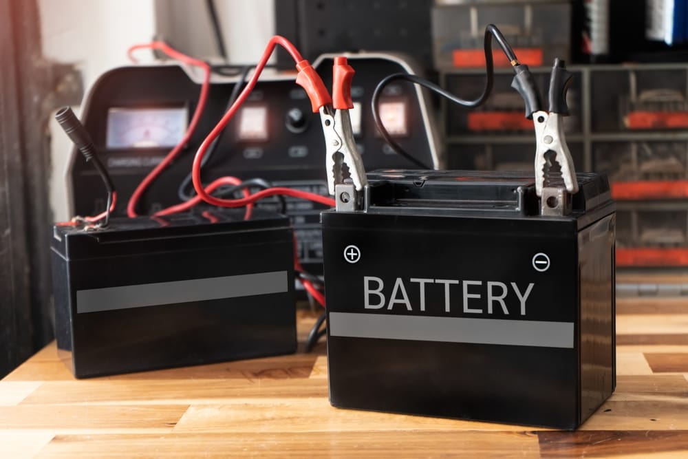 charging_a_battery_with_a_trickle_charger_shutterstock_2208679859