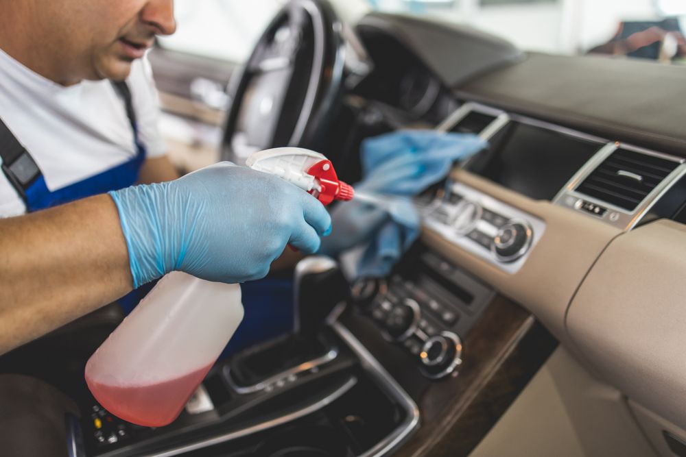 Cleaning car interior with soap and water