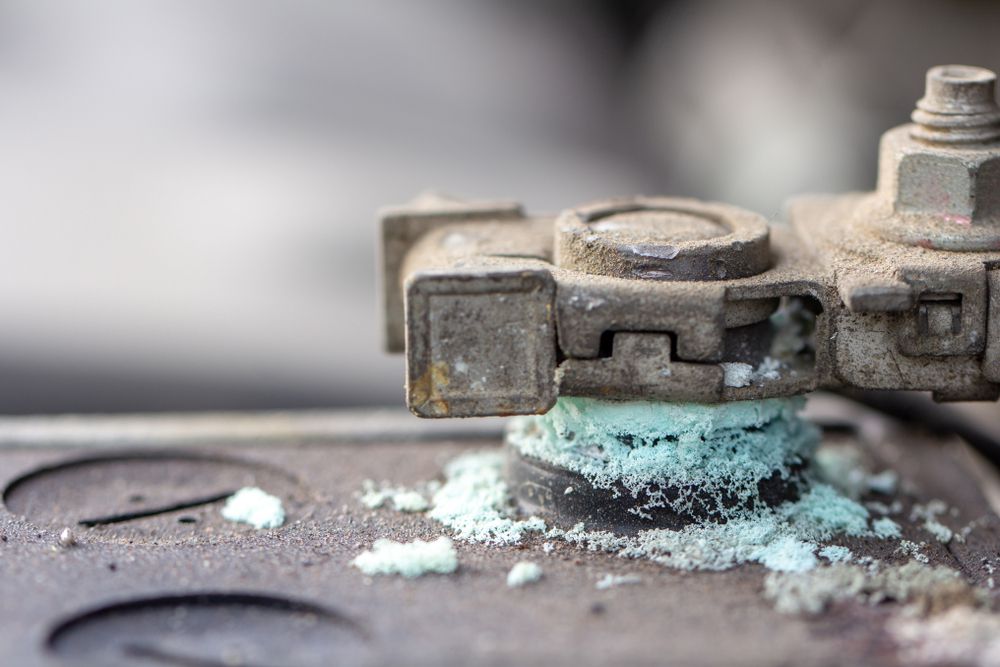 Corroded battery terminals may cause false car alarms.