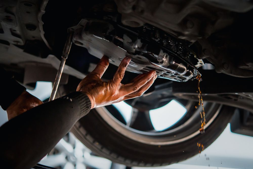 dropping_transmissions_oil_pan_shutterstock_1825643375