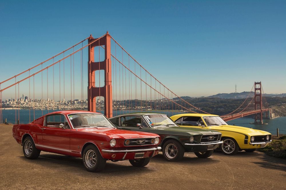 Two Ford Mustangs and a Chevrolet Camaro Muscle Cars