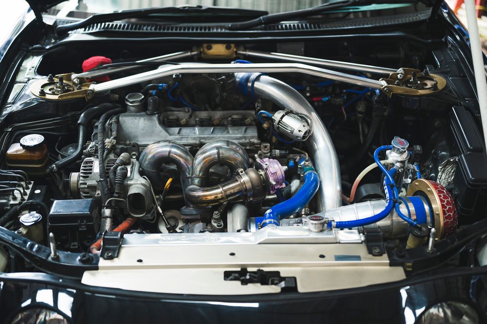 Four cylinder exhaust manifold.