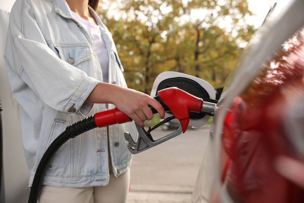 Fueling up a car with regular gas