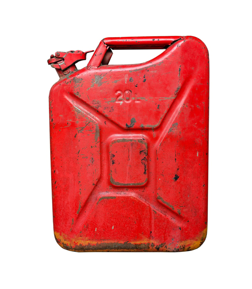 A gas can containing old gas.