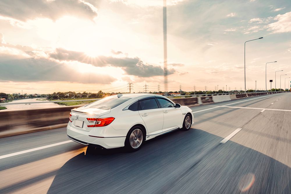 honda_accord_driving_into_sunset_shutterstock_1457566025