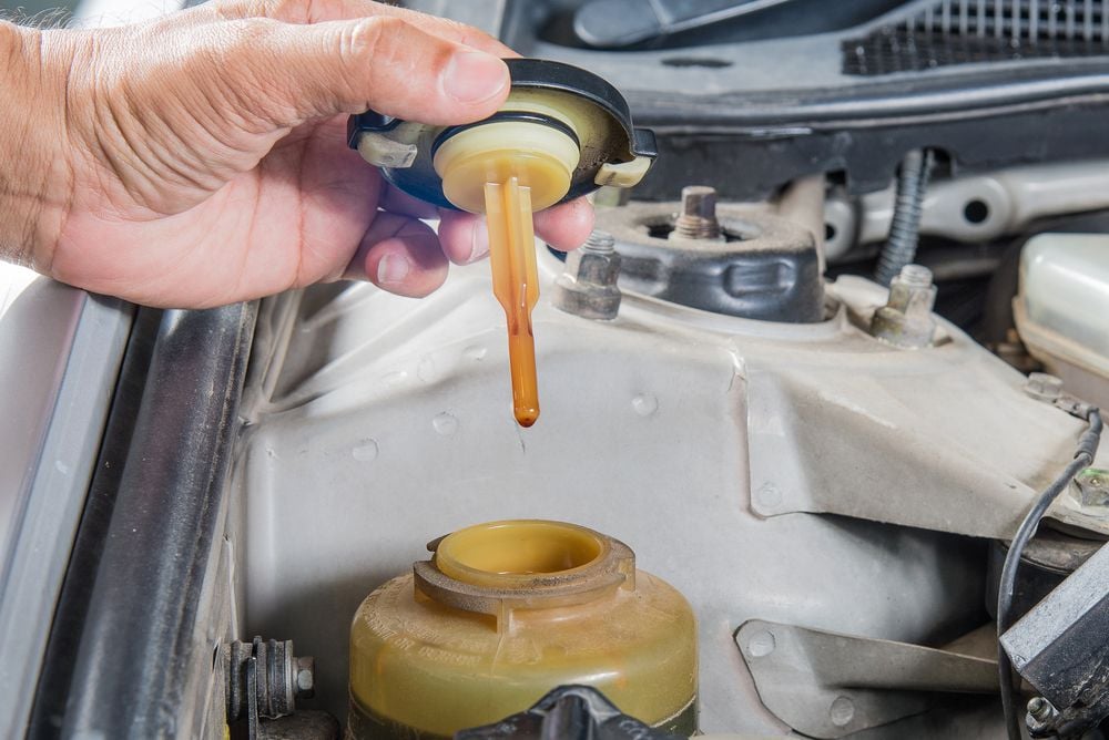 Inspecting power steering fluid color