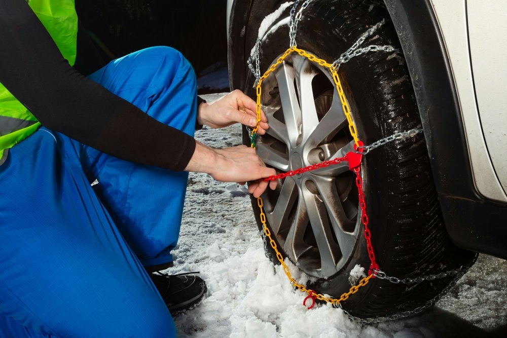 Installing tire chains is usually a relatively simple process.