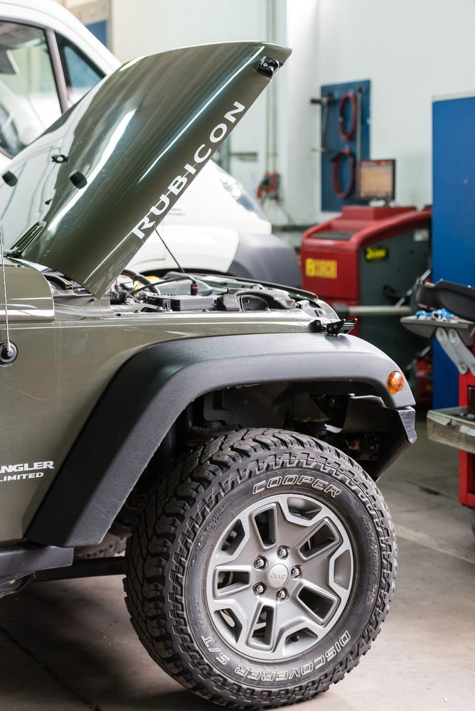 Jeep Wrangler in car repair shop