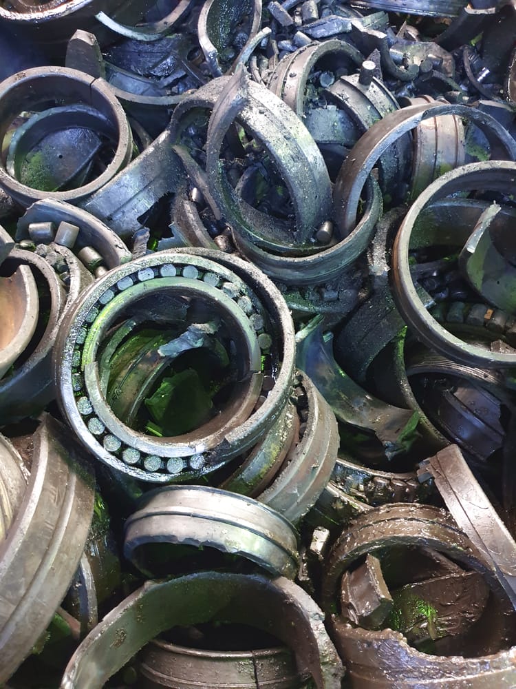 A pile of broken wheel bearings.