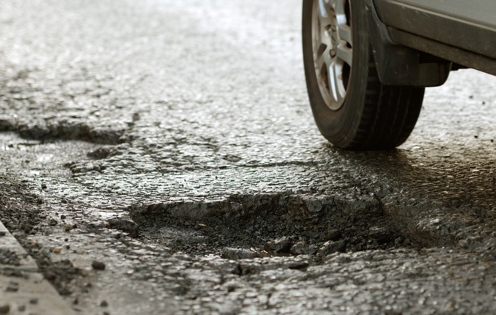 Driving over potholes can cause your tires to go out of alignment