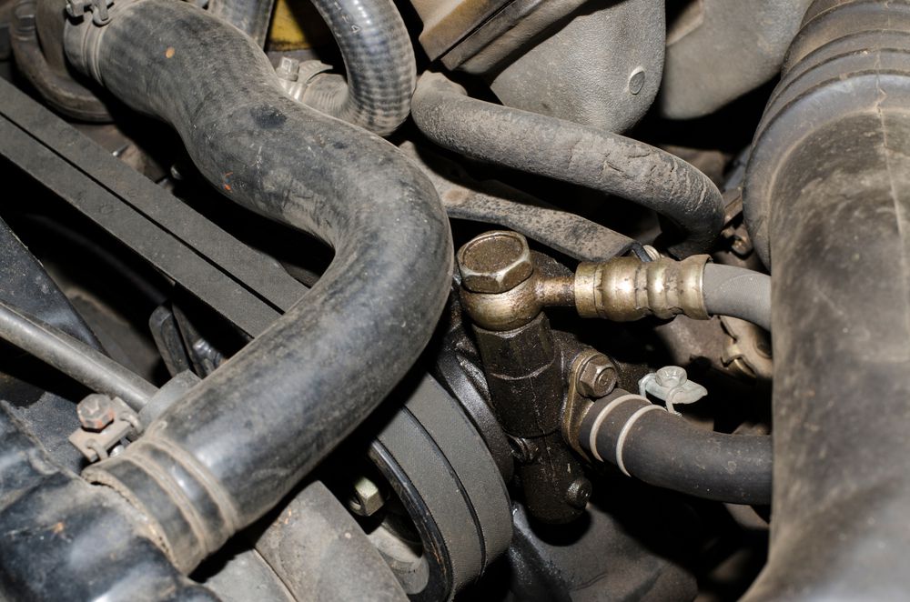 power_steering_pump_leaking_oil_shutterstock_1042743247