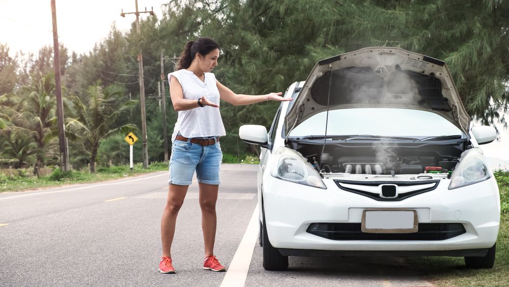 Overheated car on the side of the road