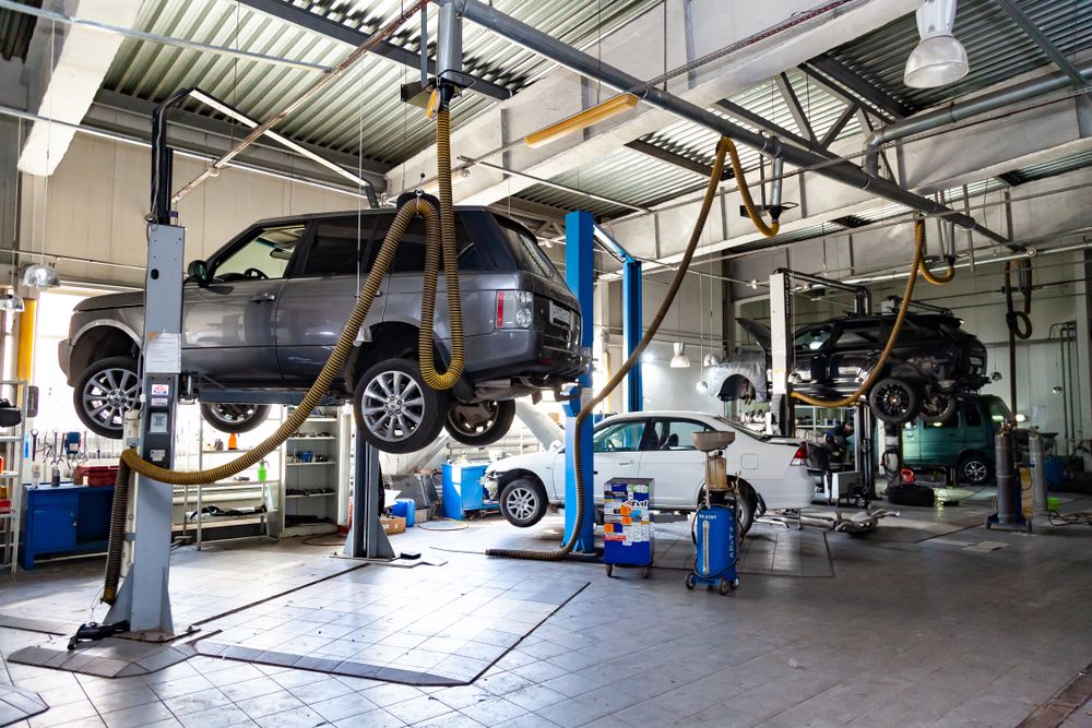 Range Rovers in the auto shop.