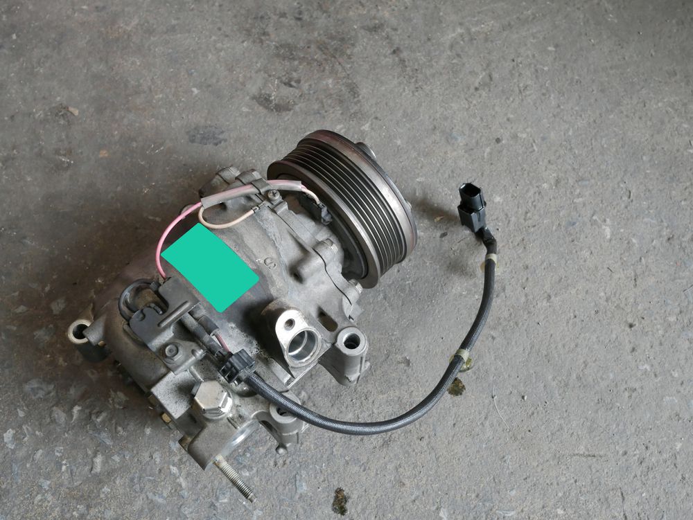 A rebuilt AC compressor.