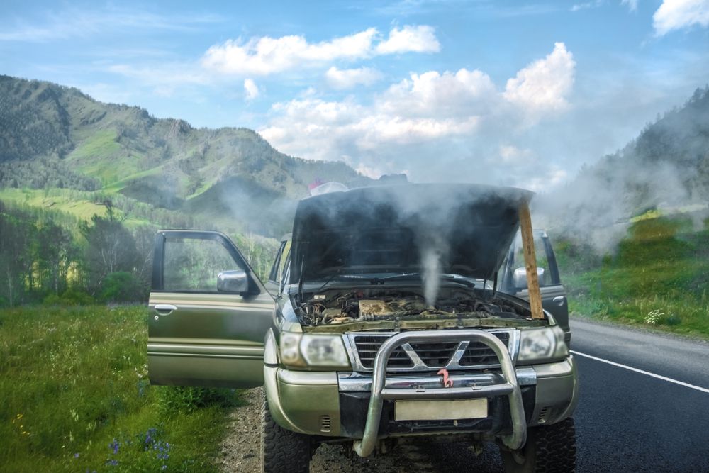 Overheated car on the side of the road