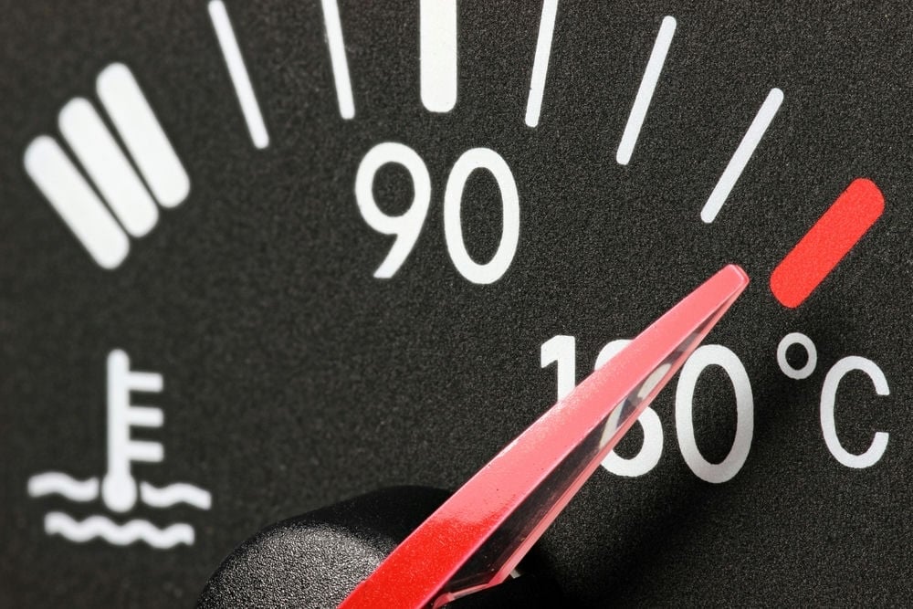 A temperature gauge indicating an overheating engine.