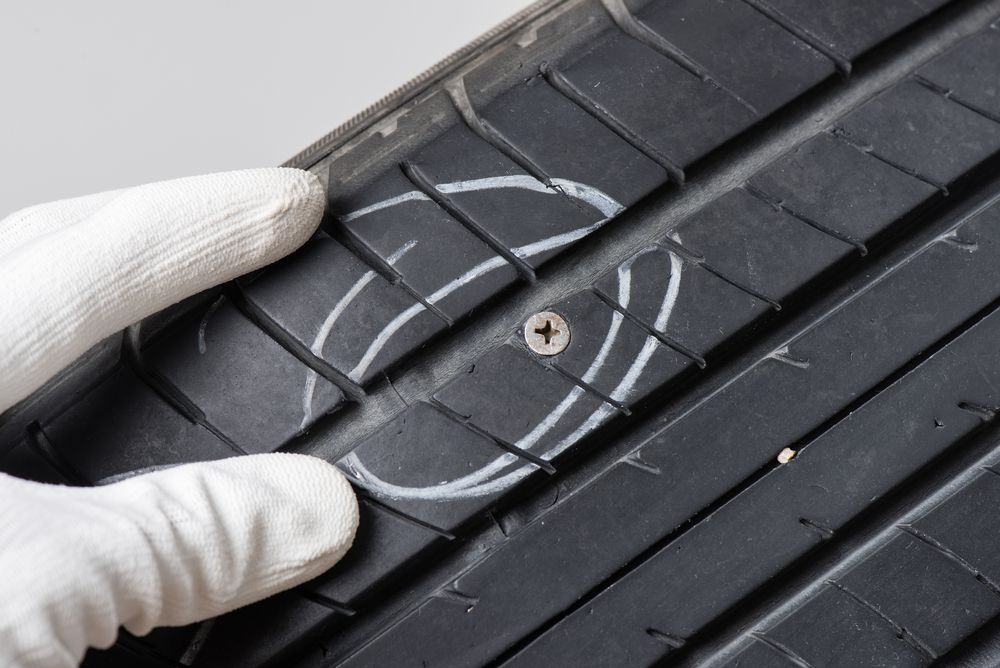A tire with a screw puncture