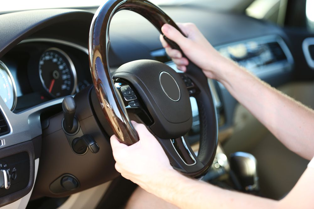 Turning a steering wheel