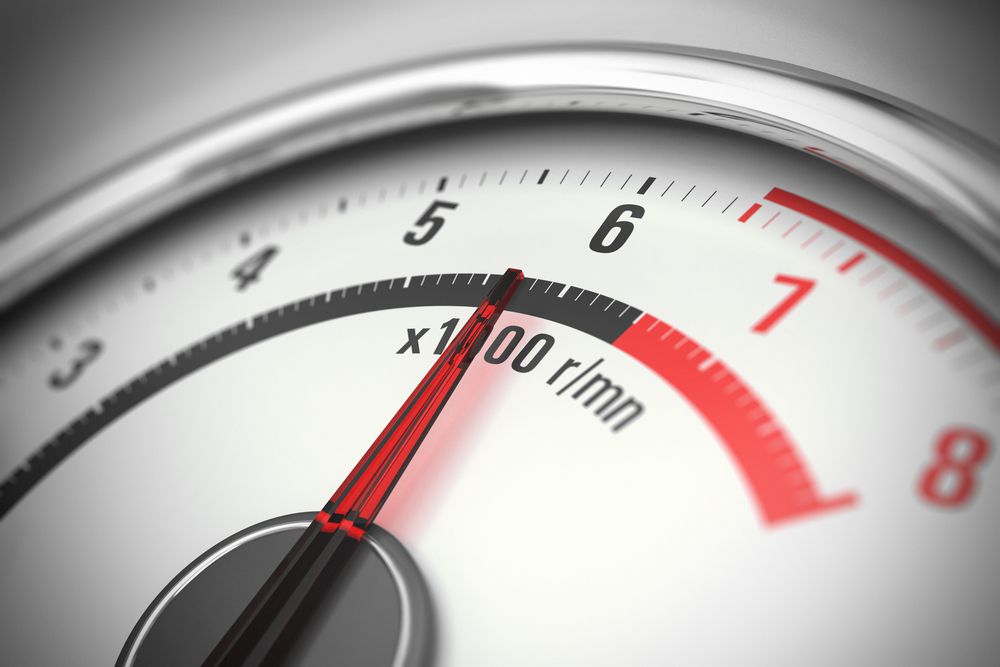 white_car_tachometer_shutterstock_117429421