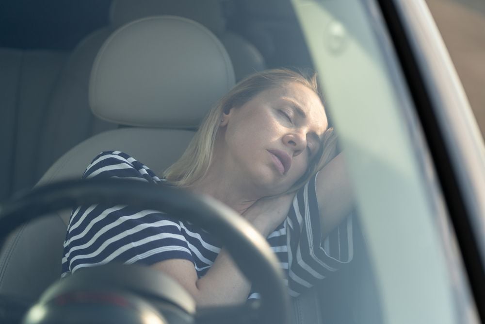 You are at risk of carbon monoxide poisoning when sleeping in a running car.