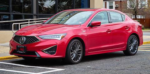 Red Acura ILX parked on the street