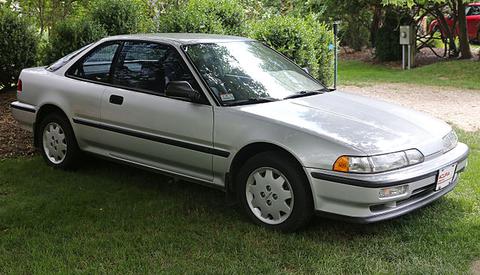 Grey '91 Acura Integra parked in the shade