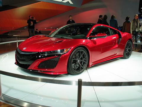 Red '15 Acura NSX at a car show 