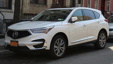 White '19 Acura RDX parked on the street 
